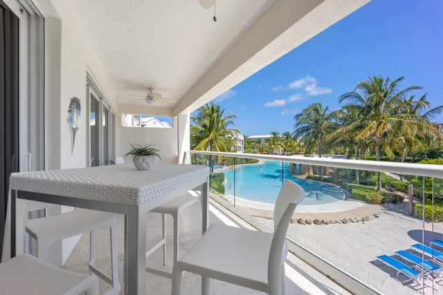 a view of a terrace and a table and chairs