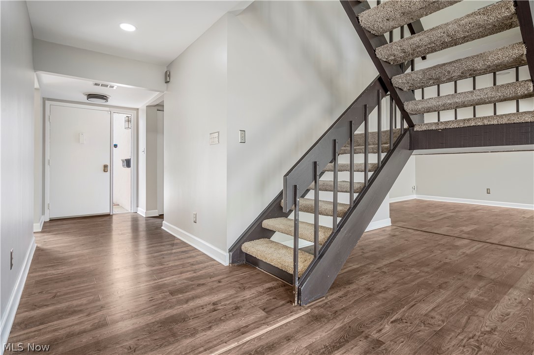 3428 South Smith Road Fairlawn, OH 44333 - Photo 21 of 30 Entryway featuring a towering ceiling and dark hardwood / wood-style floors