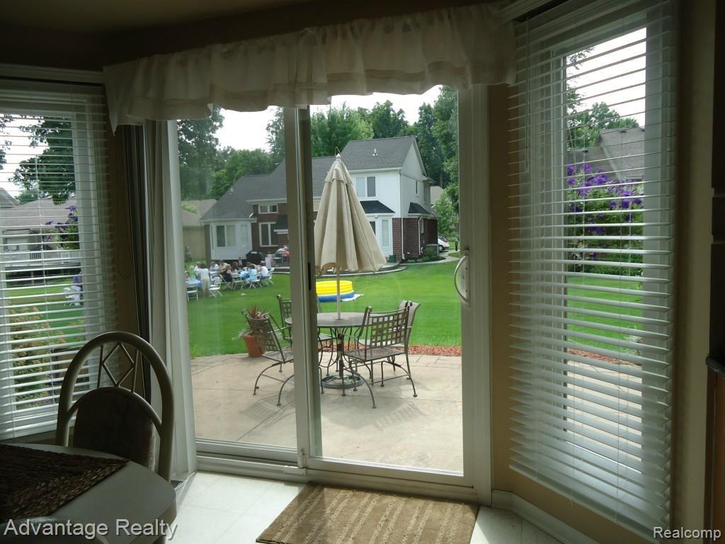 2034 Baron Rochester, MI 48307 - Photo 11 of 26 Bay door wall to nice patio