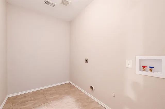 a view of a refrigerator in a kitchen