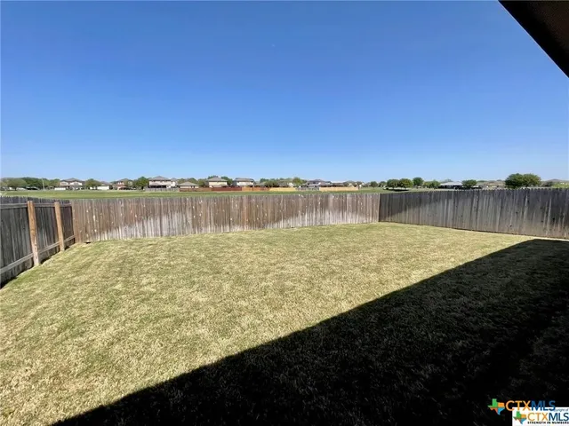 a view of a lake with a outdoor space