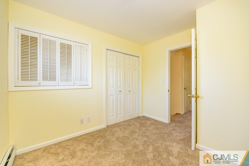 21 Baldwin Road Edison, NJ 08817 - Photo 14 of 25 a view of an empty room with a window