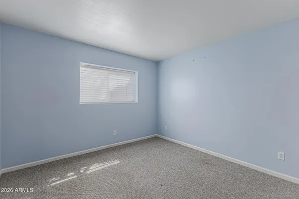 an empty room with a window