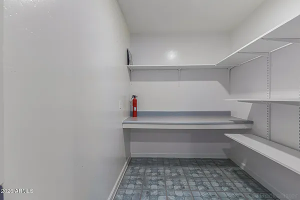 a storage room with washer and dryer