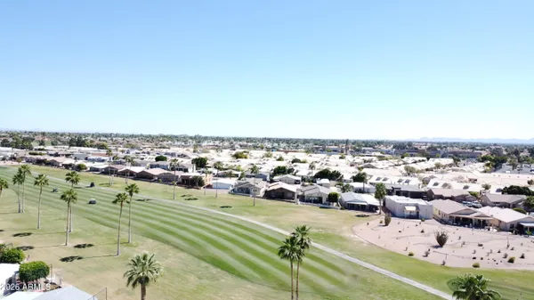 an aerial view of a city with lots of residential buildings