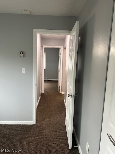 4376 Darrow Road, Unit 2 Stow, OH 44224 - Photo 21 of 26 Hall featuring dark colored carpet, baseboards, and baseboard heating