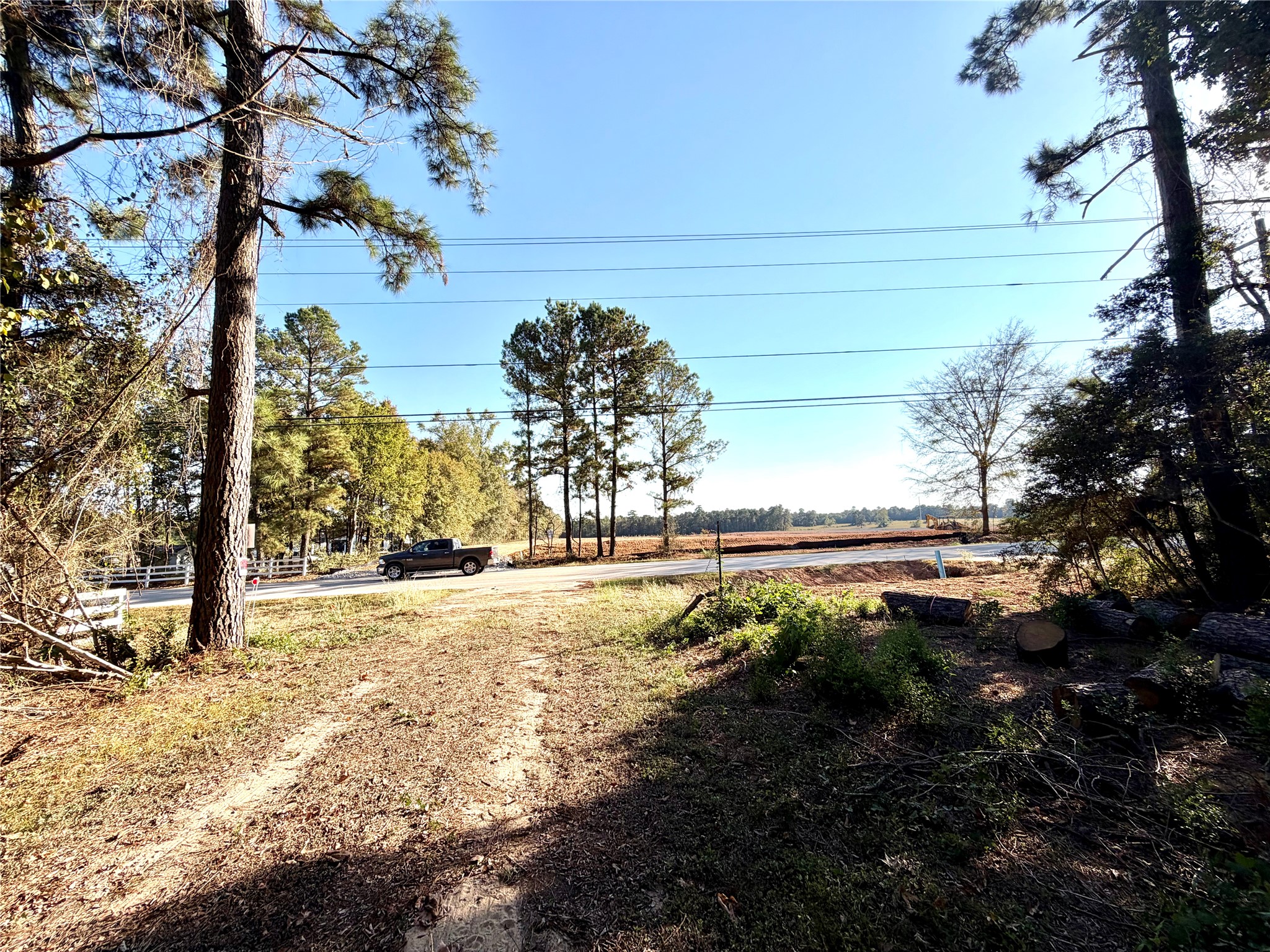 18750 Keenan Cut Off Road Montgomery, TX 77316 - Photo 16 of 43 a view of a yard with wooden fence