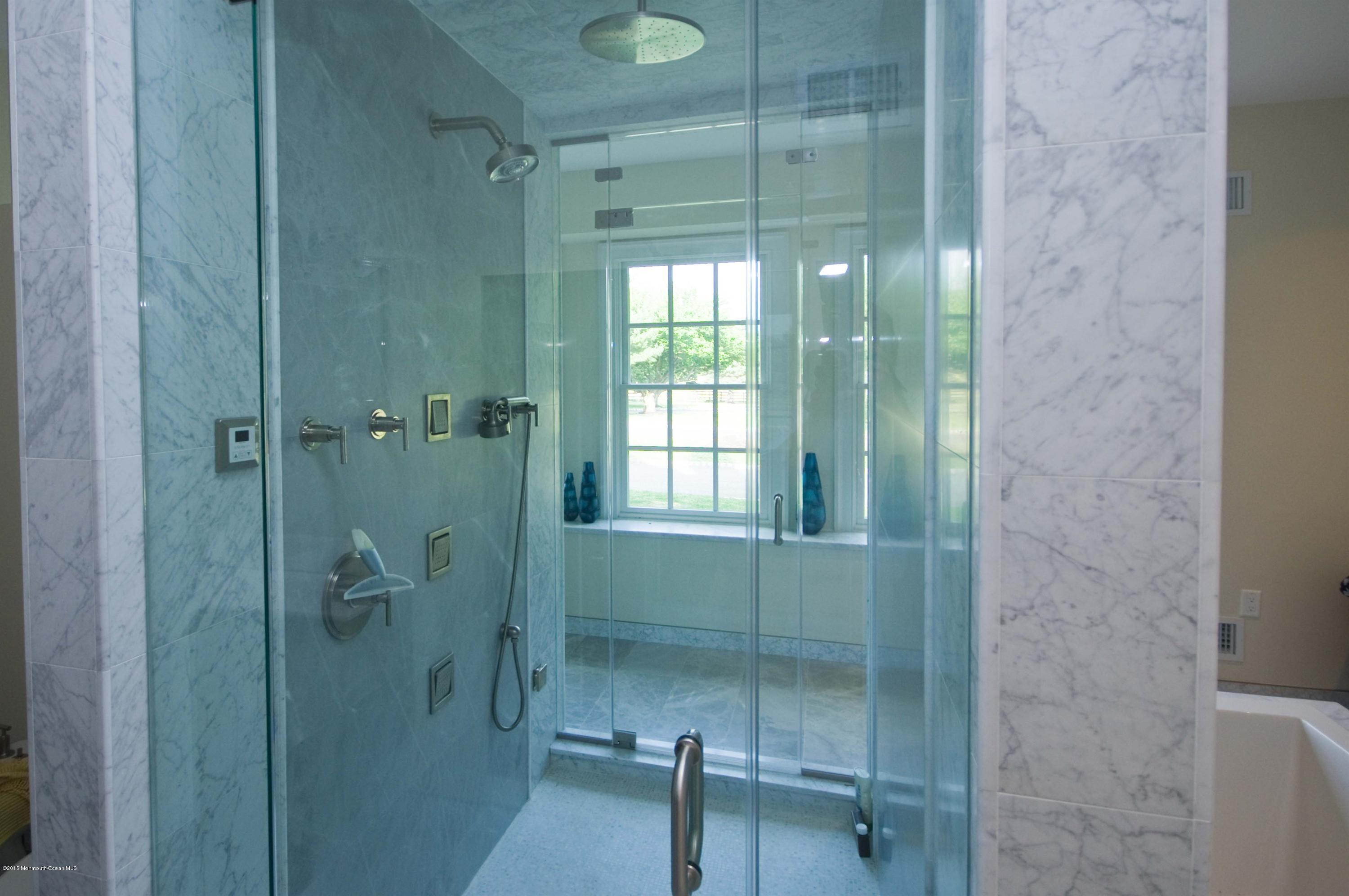 51 Phalanx Road Colts Neck, NJ 07722 - Photo 17 of 35 a bathroom with a shower