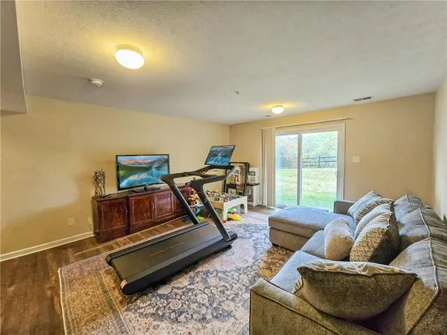 a bedroom with furniture and a couch