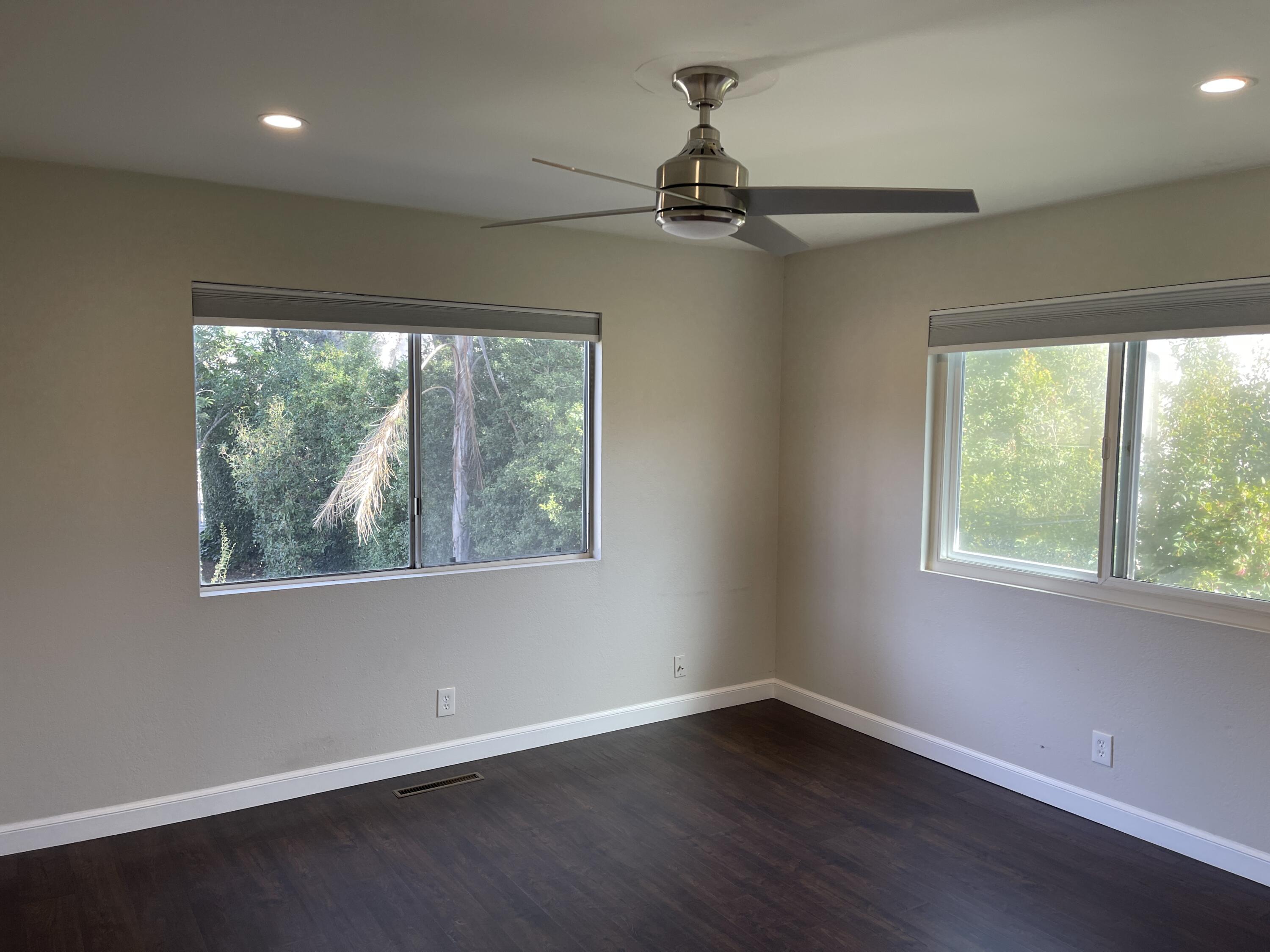 2019 Castillo Street Santa Barbara, CA 93105 - Photo 15 of 24 a view of an empty room with wooden floor and a window