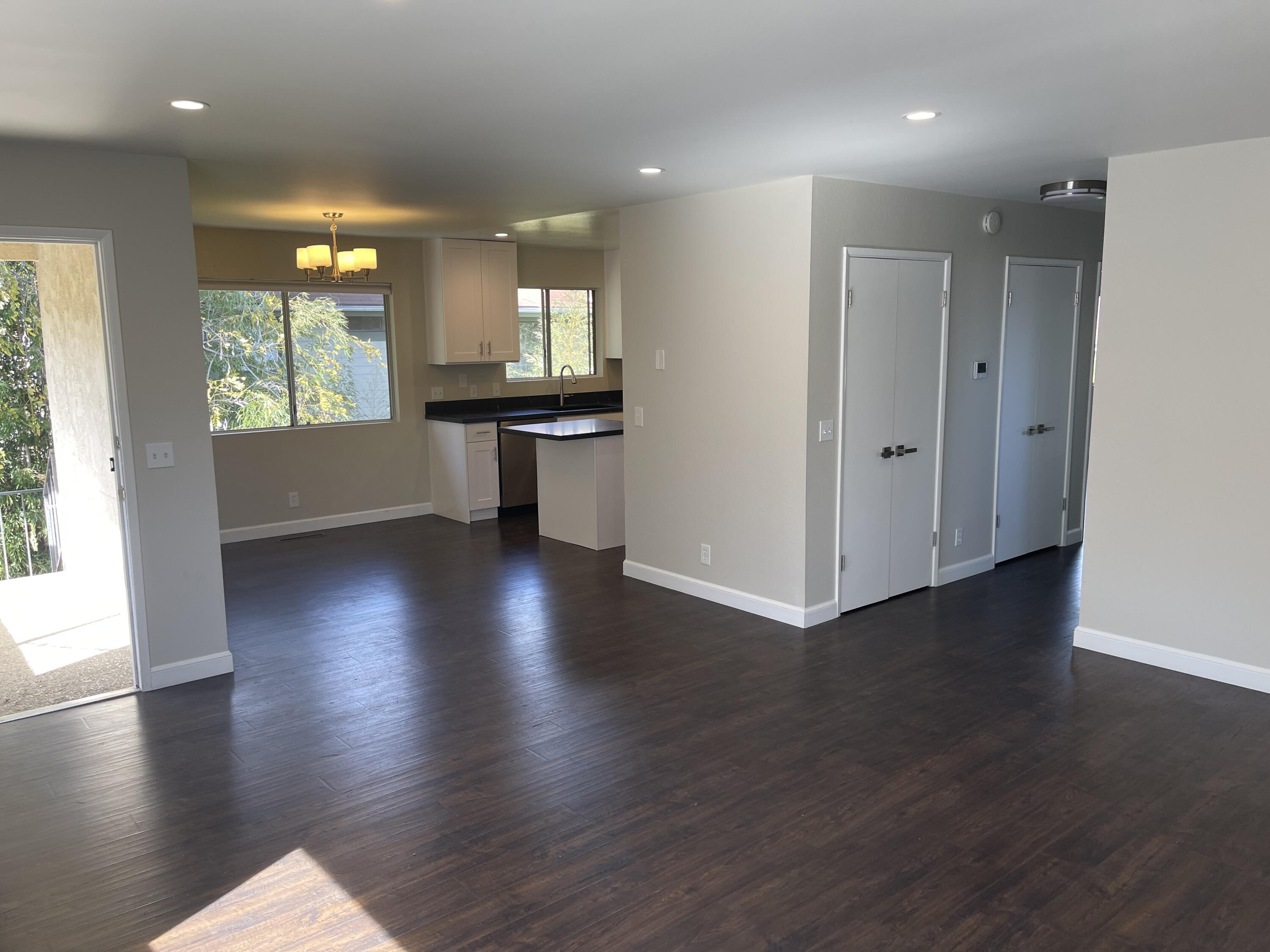2019 Castillo Street Santa Barbara, CA 93105 - Photo 20 of 24 an empty room with wooden floor and windows