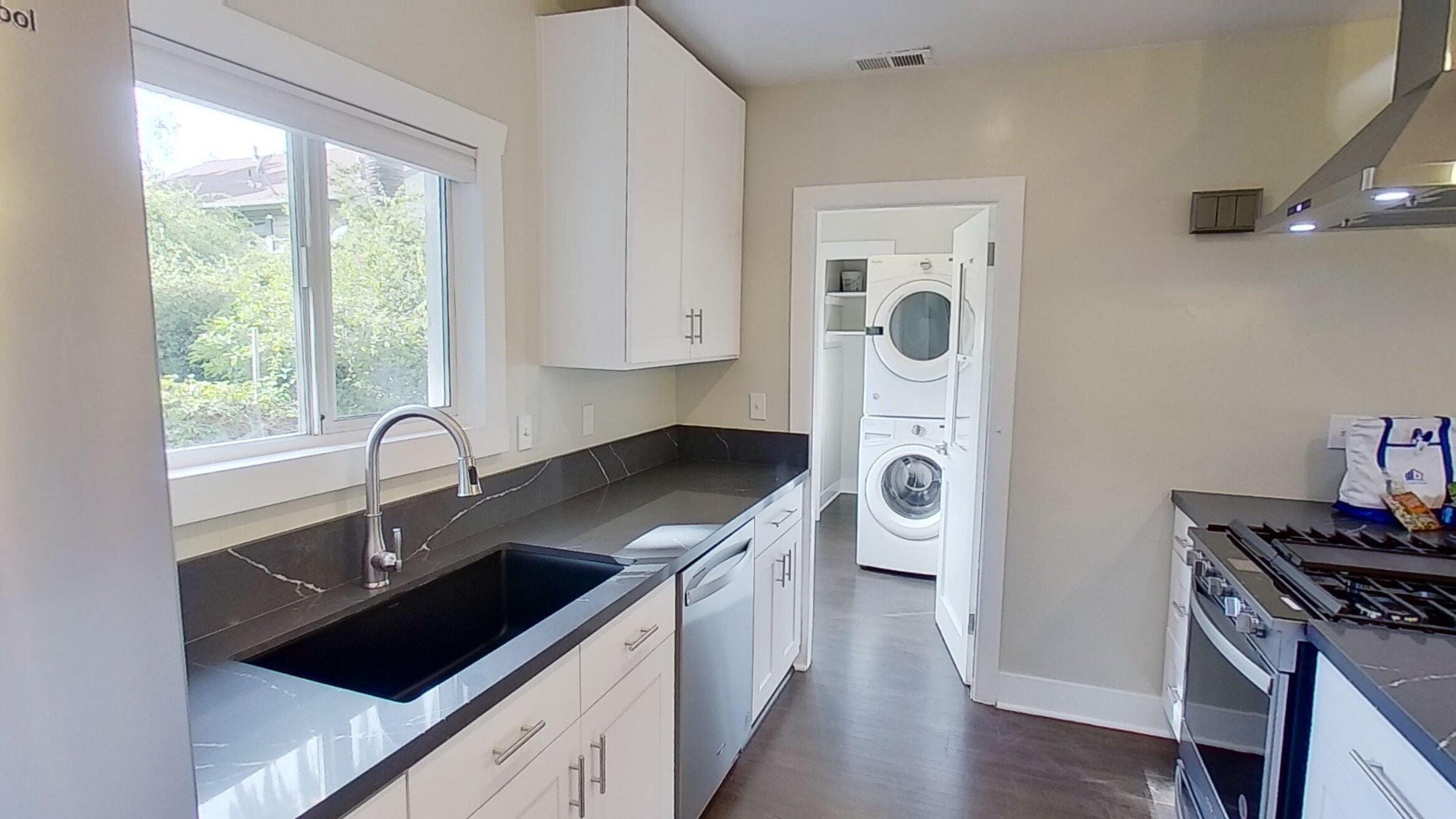 2019 Castillo Street Santa Barbara, CA 93105 - Photo 8 of 24 a kitchen with a sink dishwasher a stove and a refrigerator