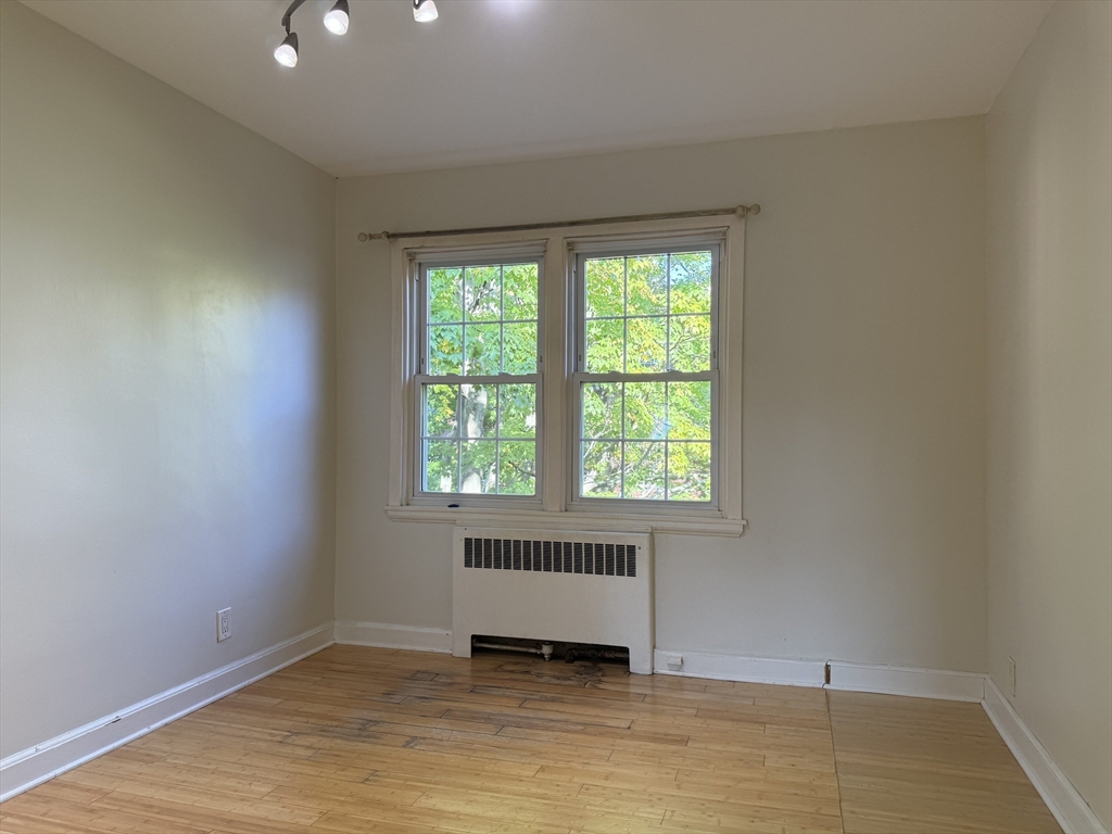 1 Dexter Street, Unit 5 Malden, MA 02148 - Photo 6 of 17 a view of a livingroom with a window