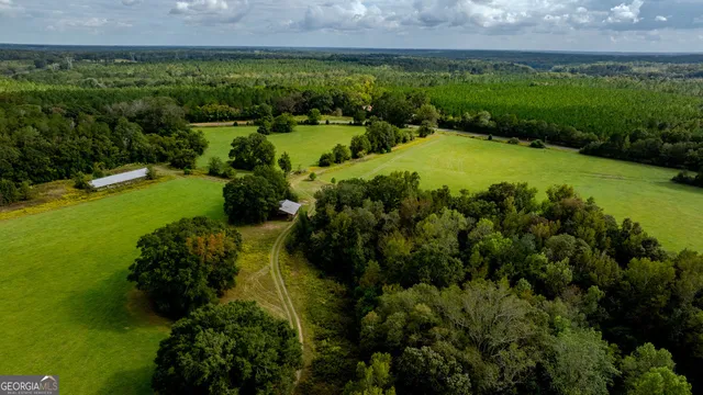 a view of a lake with a yard