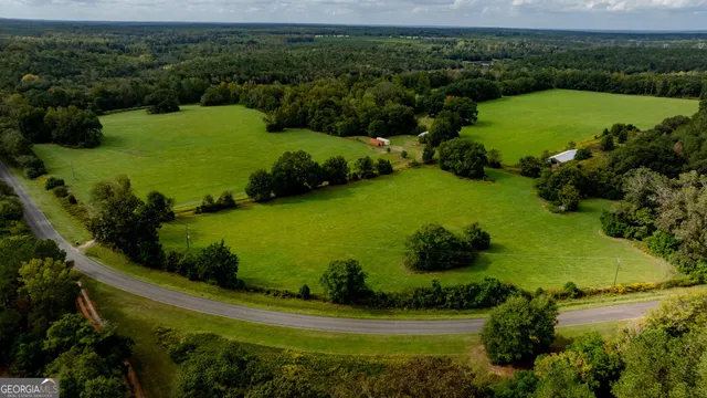 a view of a yard with an outdoor space