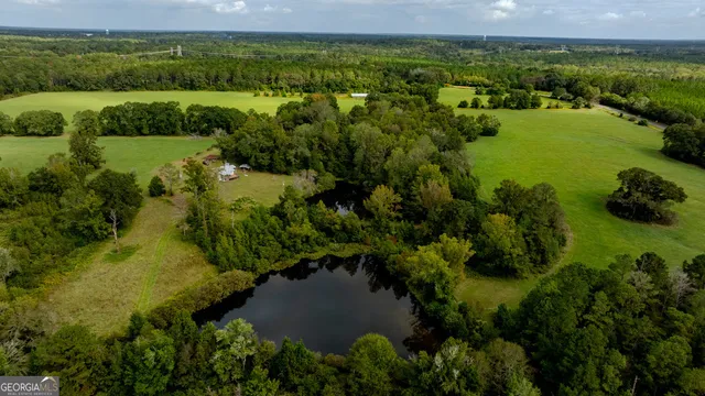 an aerial view of a yard with green space