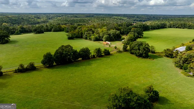 a view of a lake with a yard