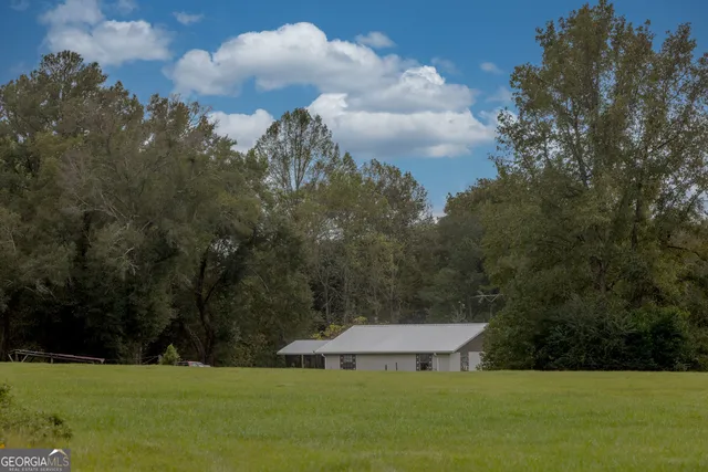 a view of an ocean and a yard