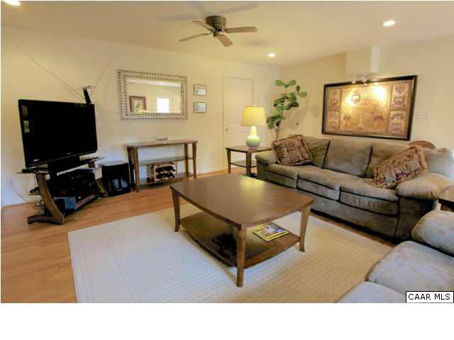 2608 Huntington Road Charlottesville, VA 22901 - Photo 5 of 22 a living room with furniture and a flat screen tv