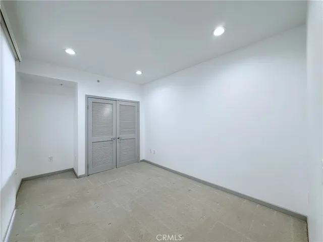 a bathroom with a toilet sink and shower