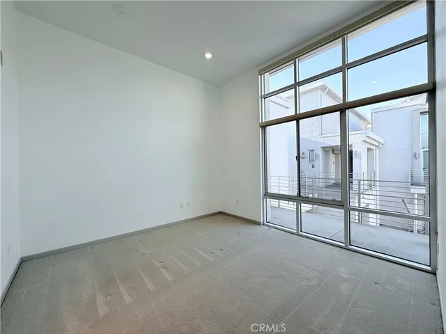 an empty room with a large window