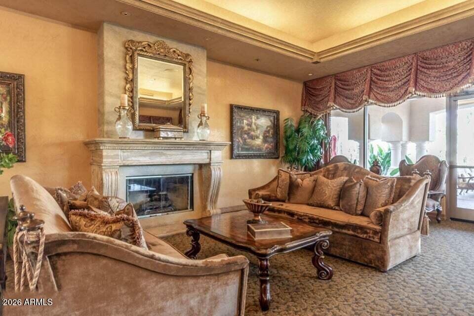 2550 South Ellsworth Road, Unit 46 Mesa, AZ 85209 - Photo 39 of 47 a living room with furniture and a fireplace