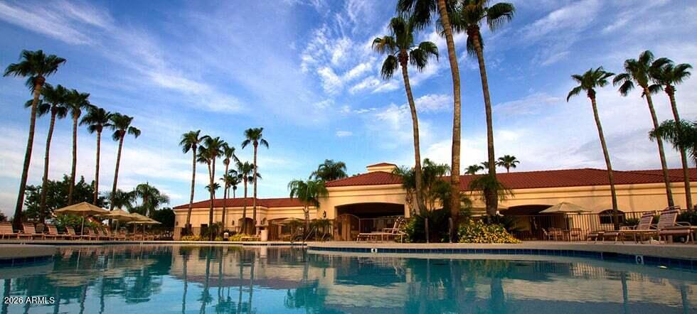 2550 South Ellsworth Road, Unit 46 Mesa, AZ 85209 - Photo 45 of 47 a view of house with yard swimming pool and outdoor seating
