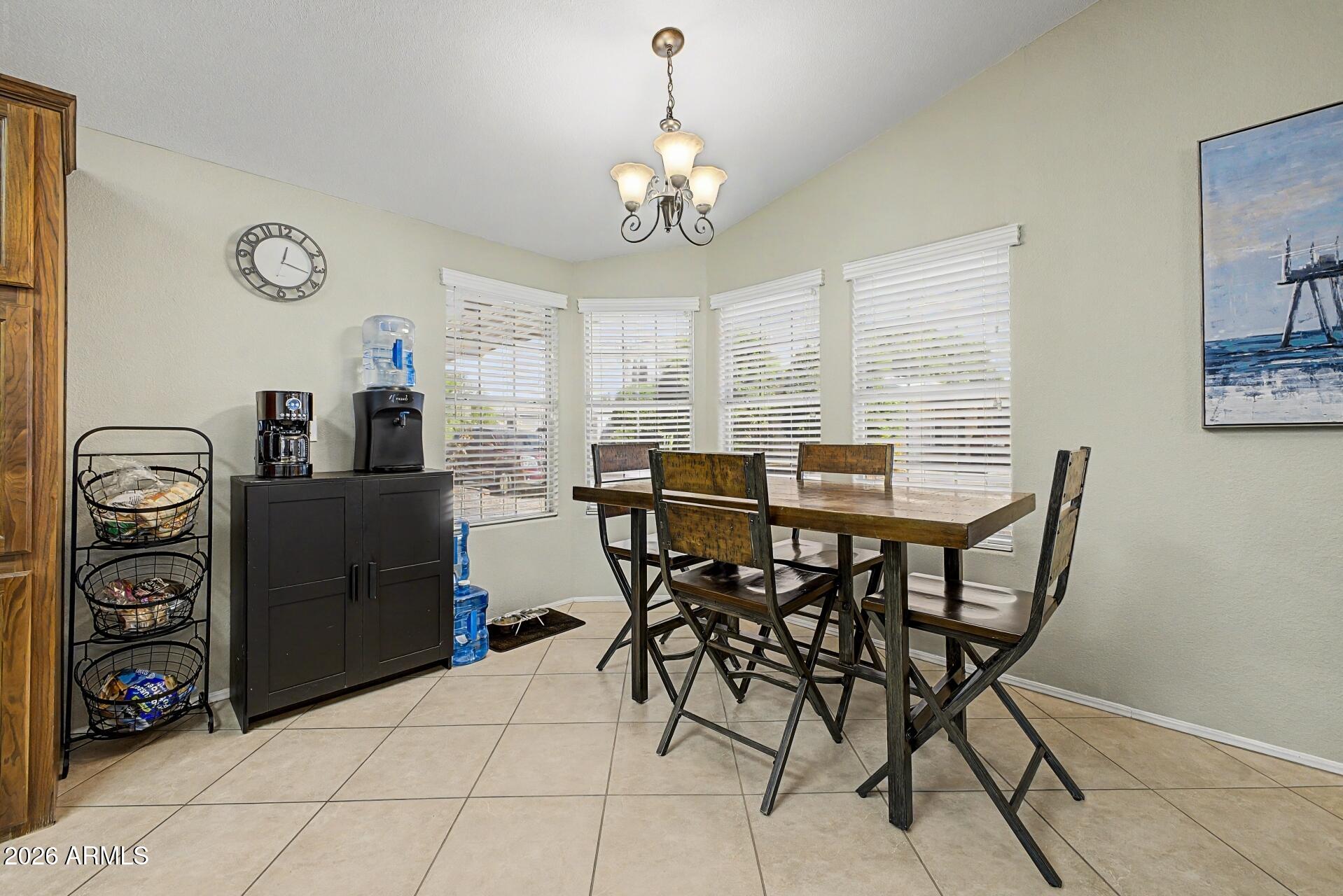 2550 South Ellsworth Road, Unit 46 Mesa, AZ 85209 - Photo 8 of 47 a dining room with furniture and window