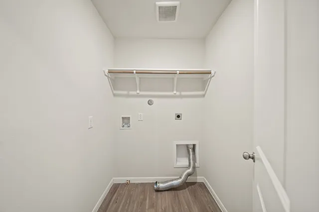 a view of small space with racks on the wall