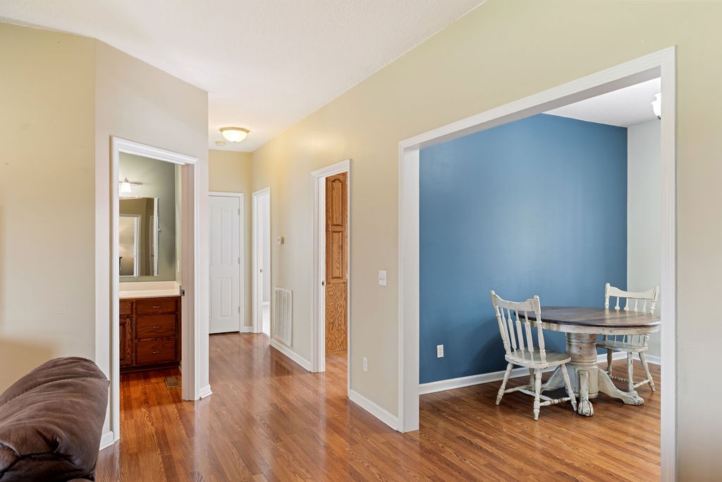 137 Piney Road Lawrenceburg, TN 38464 - Photo 11 of 33 a view of a livingroom with furniture and wooden floor