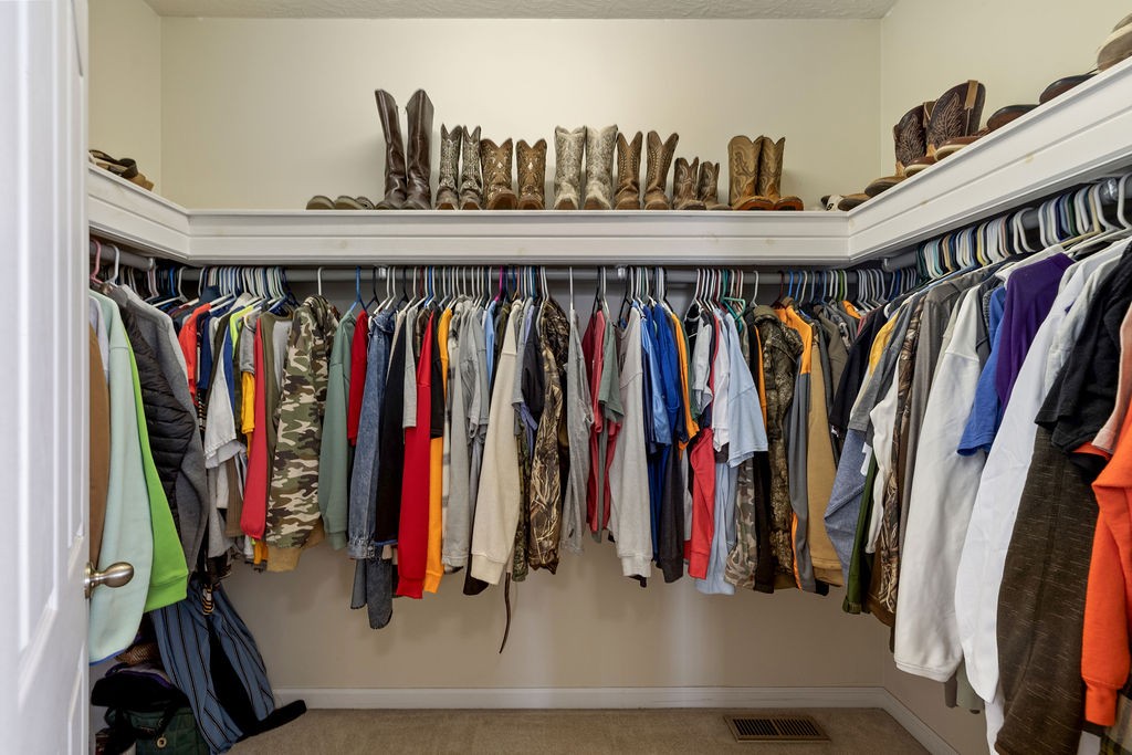 137 Piney Road Lawrenceburg, TN 38464 - Photo 20 of 33 a view of walk in closet with clothes