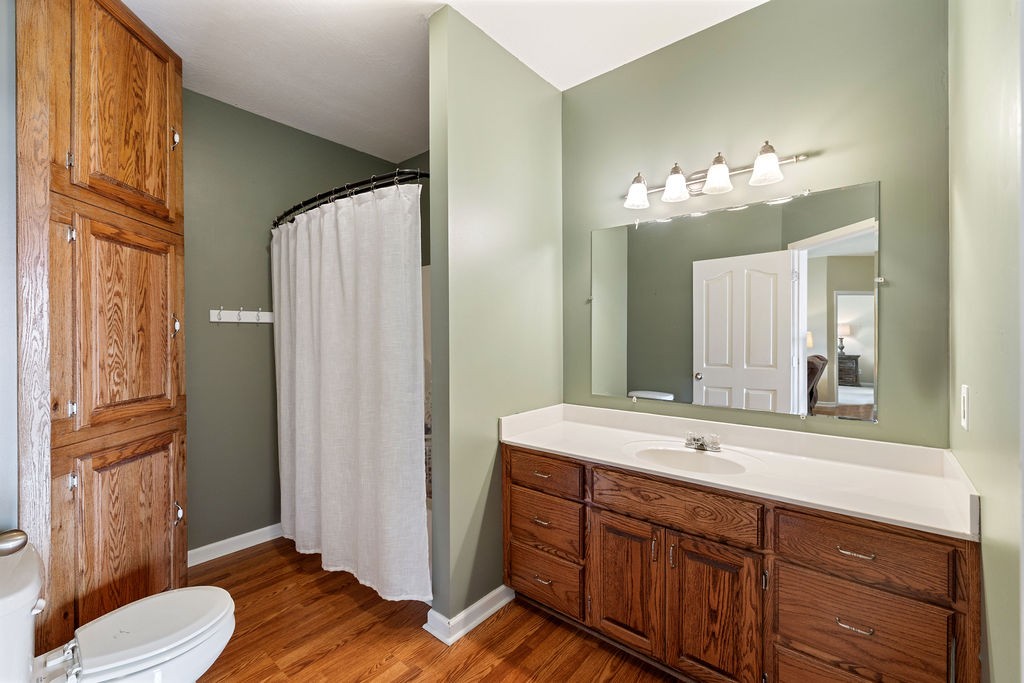 137 Piney Road Lawrenceburg, TN 38464 - Photo 21 of 33 a bathroom with a double vanity sink and a mirror
