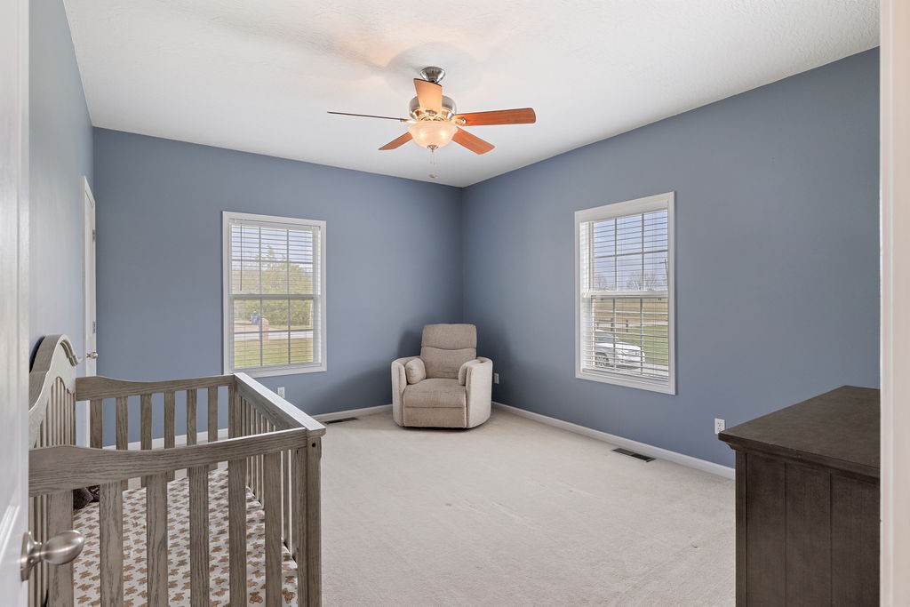 137 Piney Road Lawrenceburg, TN 38464 - Photo 22 of 33 a bedroom with furniture and windows