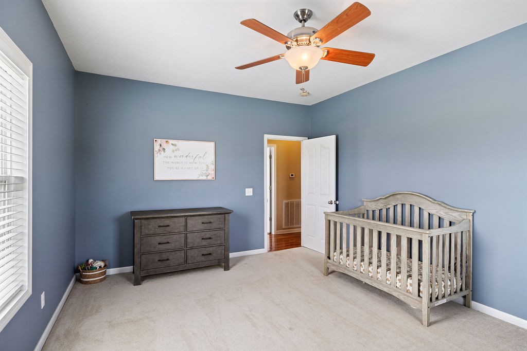 137 Piney Road Lawrenceburg, TN 38464 - Photo 23 of 33 a view of livingroom with a baby crib