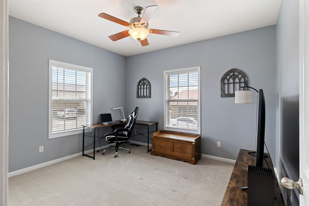 137 Piney Road Lawrenceburg, TN 38464 - Photo 24 of 33 a view of a livingroom with workspace and a window