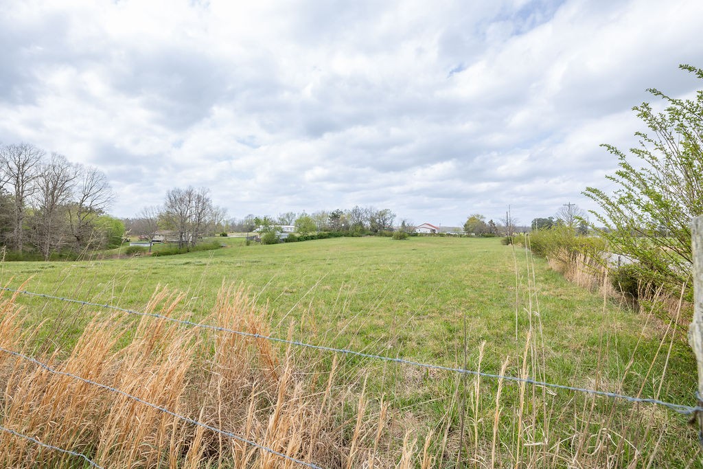 137 Piney Road Lawrenceburg, TN 38464 - Photo 28 of 33 a view of a lake with a big yard