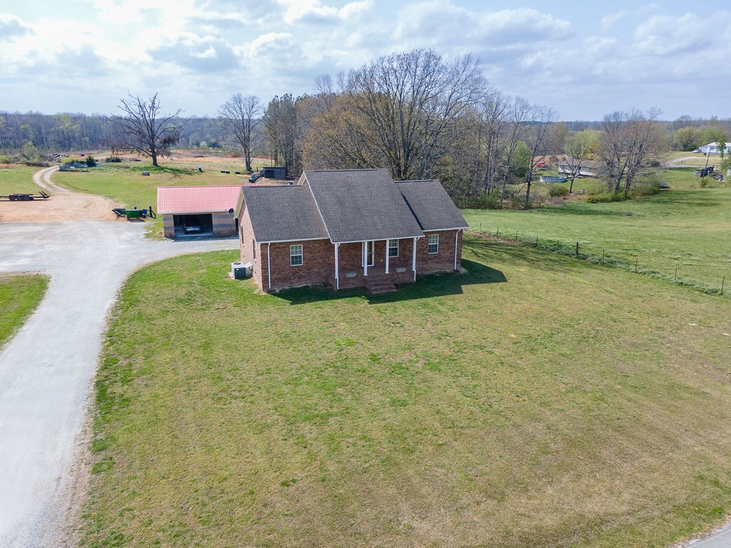 137 Piney Road Lawrenceburg, TN 38464 - Photo 4 of 33 a view of a swimming pool and outdoor space