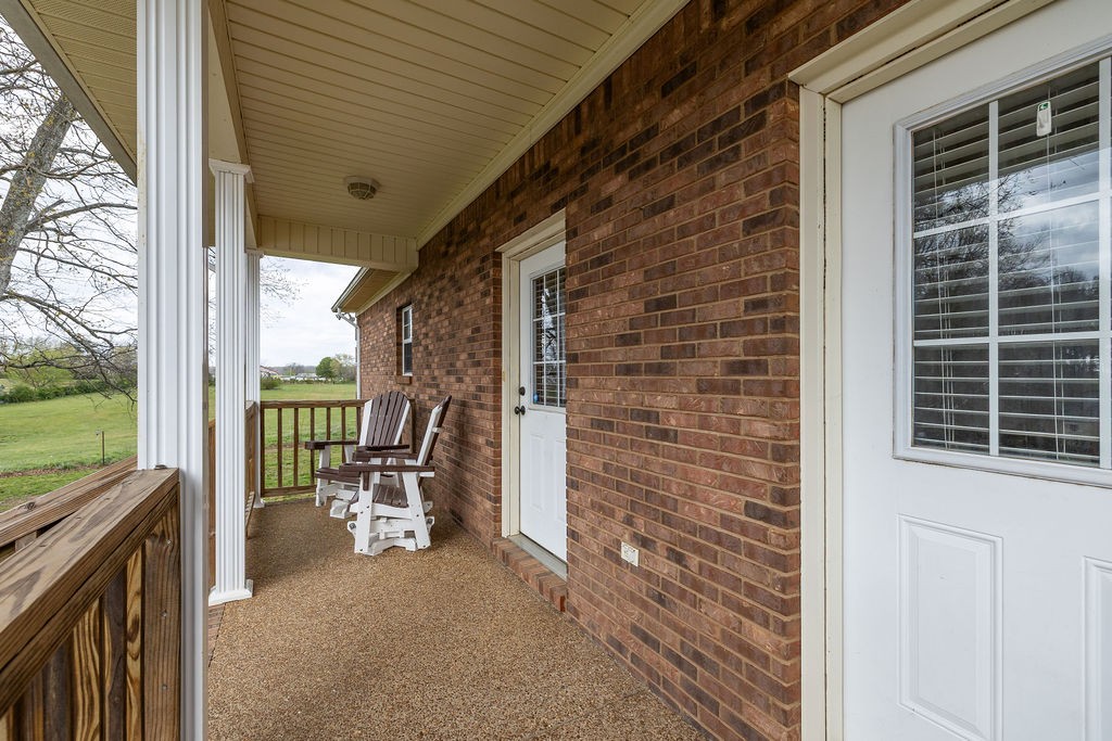 137 Piney Road Lawrenceburg, TN 38464 - Photo 5 of 33 a view of a porch with chairs