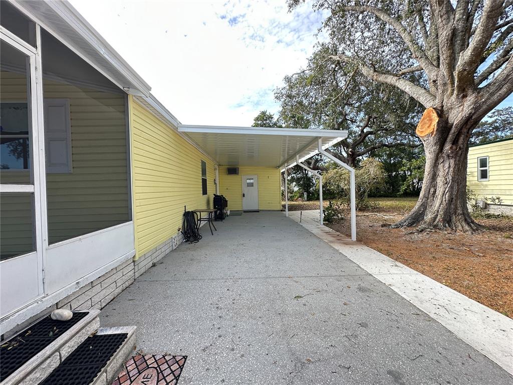 16735 Olivaud Street Hudson, FL 34667 - Photo 6 of 53 a view of a house with a yard