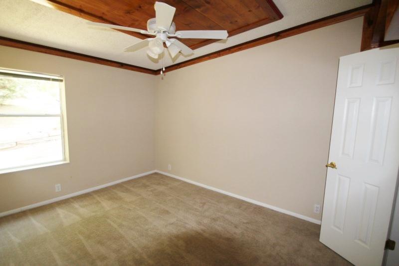 6019 Gagnon Road Crestview, FL 32539 - Photo 14 of 36 a view of a small space with a window and a ceiling fan