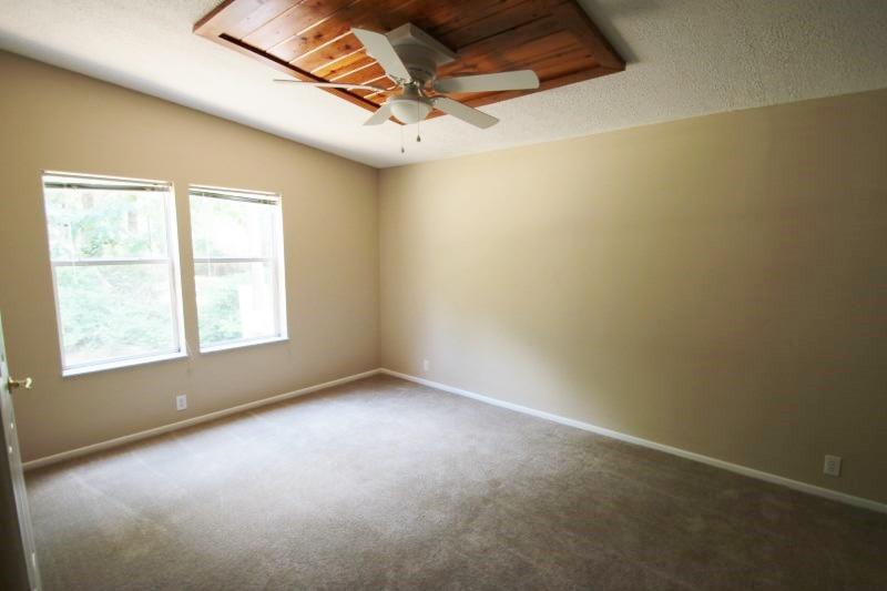 6019 Gagnon Road Crestview, FL 32539 - Photo 15 of 36 an empty room with a empty space and windows