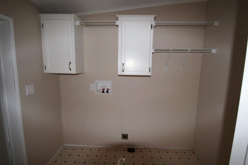 6019 Gagnon Road Crestview, FL 32539 - Photo 26 of 36 a bathroom with a window