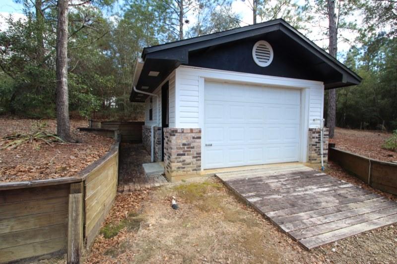 6019 Gagnon Road Crestview, FL 32539 - Photo 6 of 36 a view of a garage of the house