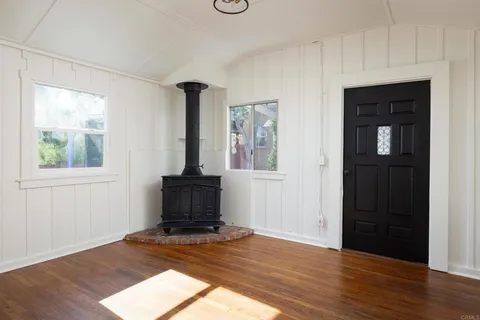 a kitchen with a refrigerator and a sink