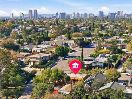 an aerial view of a city with lots of residential buildings