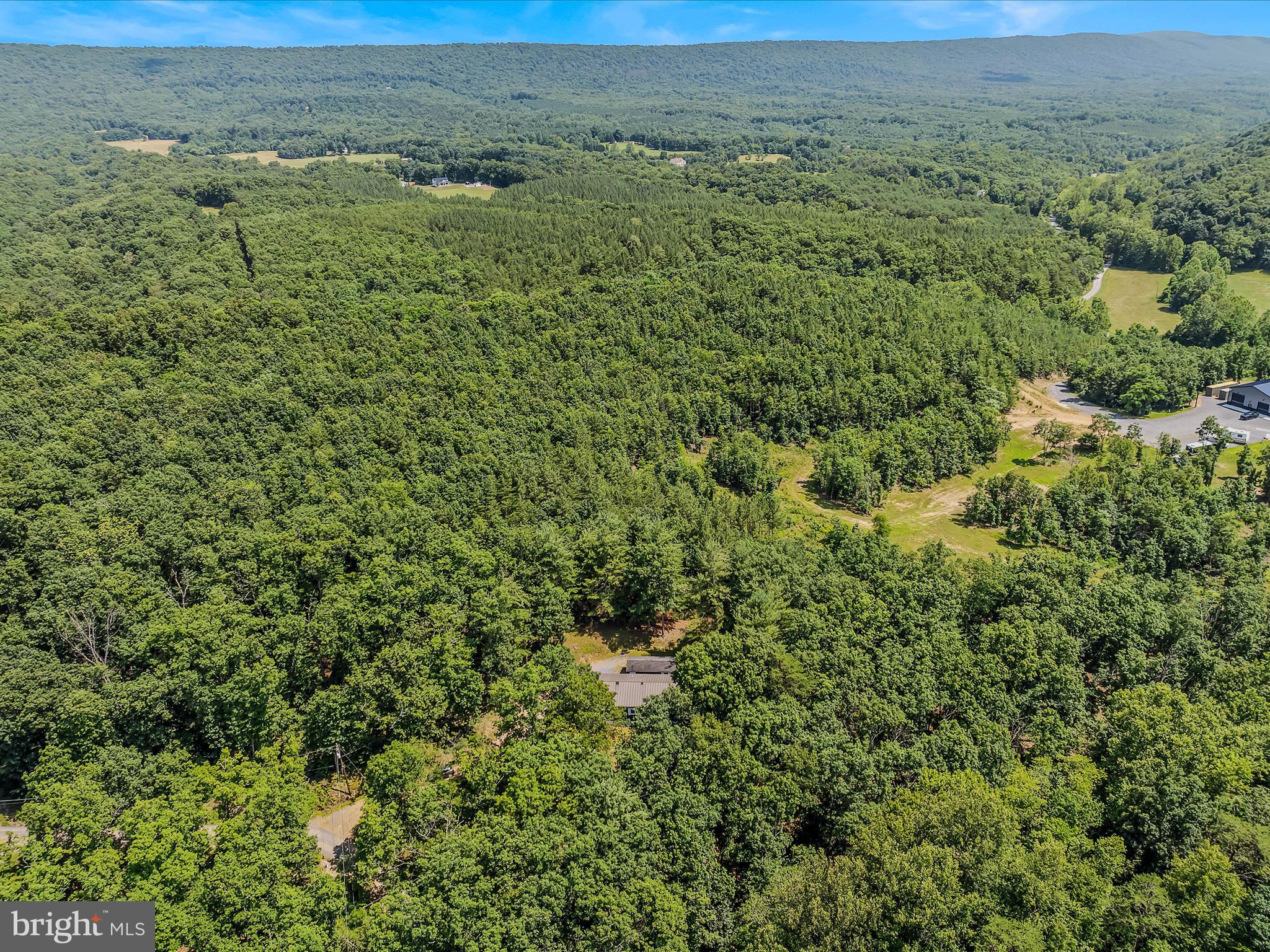 378 Oak Hill Road Berkeley Springs, WV 25411 - Photo 27 of 57 view of a field with an outdoor space