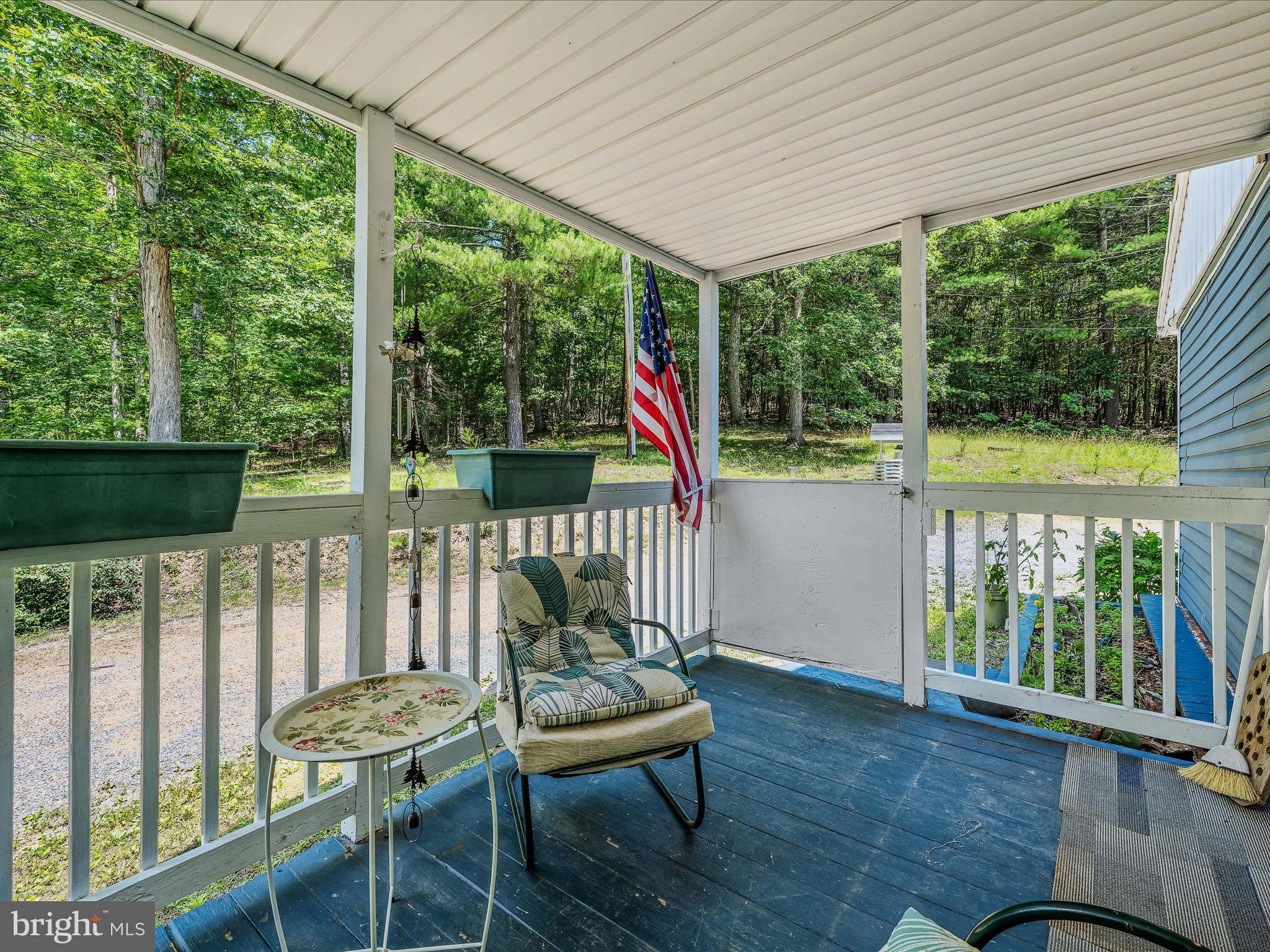 378 Oak Hill Road Berkeley Springs, WV 25411 - Photo 5 of 57 a view of a chairs in balcony