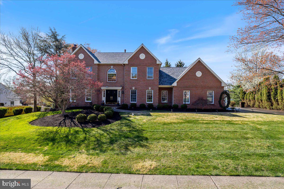 1488 Heather Ridge Drive Newtown, PA 18940 - Photo 2 of 46 a front view of a house with a yard