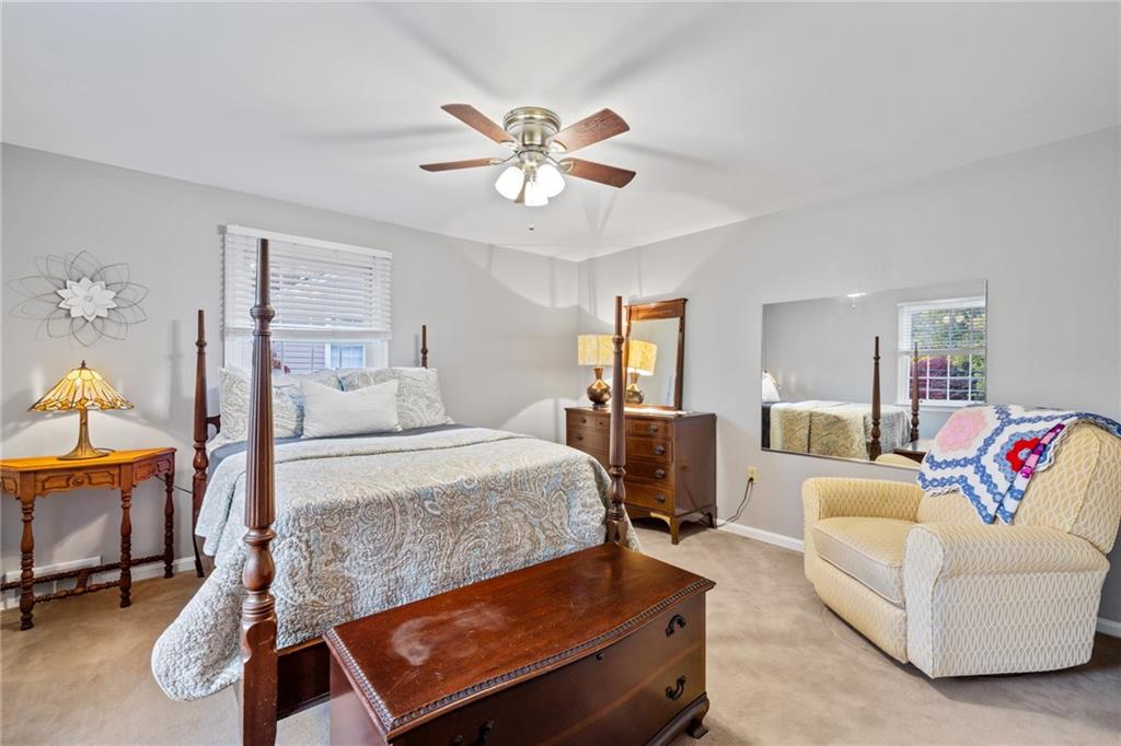 800 Hulton Road Oakmont, PA 15139 - Photo 13 of 25 a bedroom with a bed a couch and dresser