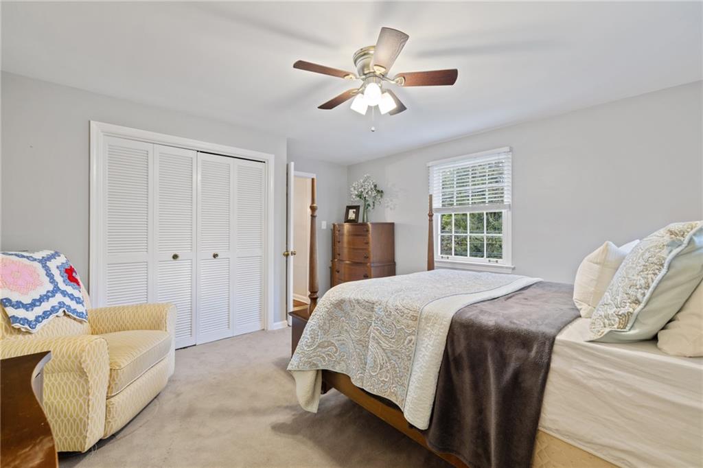 800 Hulton Road Oakmont, PA 15139 - Photo 14 of 25 a bed room with a bed and a couch